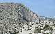  Vue du Rempart sur le col et la falaise du Renard (escalade). On distingue une petite grotte en contre-bas.  (c) Christophe ANTOINE
520*327 pixels (37855 octets)(i1458)