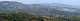 panorama depuis le sommet au dessus de la Grotte des Fées. En deuxième plan de gauche à droite:  le pic de Taoumé, le Pounche des Escaouprés, la Grande Tête Rouge. (c) Christophe ANTOINE
1000*272 pixels (26283 octets)(i1832)