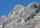  Vue de St Antonin sur la Croix de Provence (zoom) . A gauche la brèche des Moines,  A droite le gouffre du Garagai. (c) Christophe ANTOINE
500*357 pixels (31321 octets)(i1561)